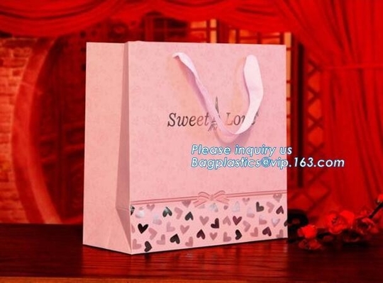 Bolsas de papel de calidad superior de Brown del regalo del botón de lujo del metal con la manija fuerte, l promocional adaptable respetuoso del medio ambiente reutilizable